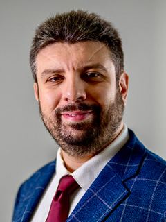 Portrait of Taner Cokyasar
